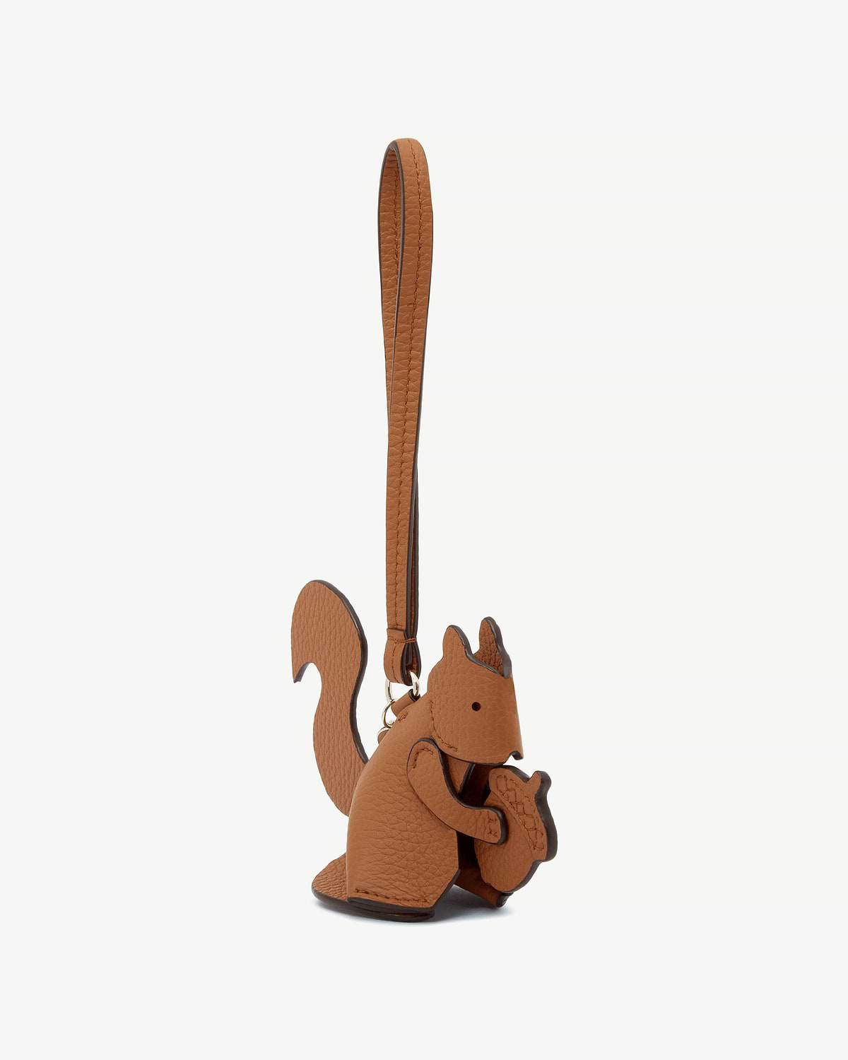 Tan leather squirrel-shaped bag charm with strap and gold ring