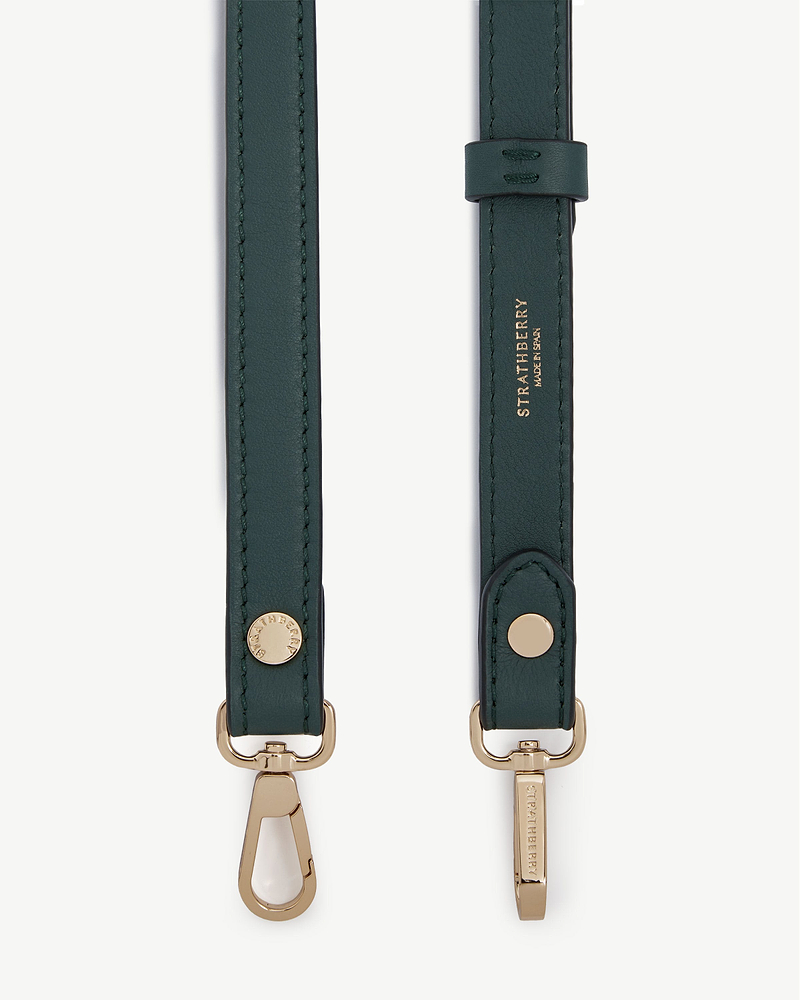 Bottle green thin adjustable leather strap with gold hardware and Strathberry logo.
