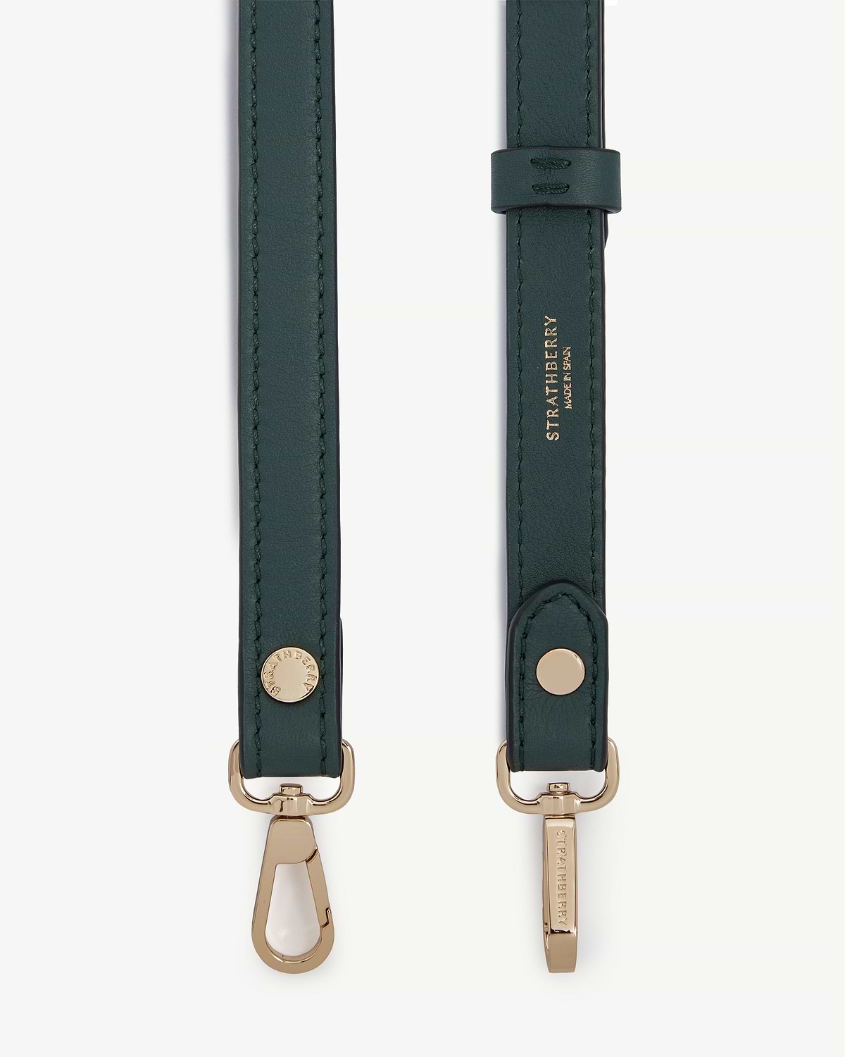 Bottle green thin adjustable leather strap with gold hardware and Strathberry logo.