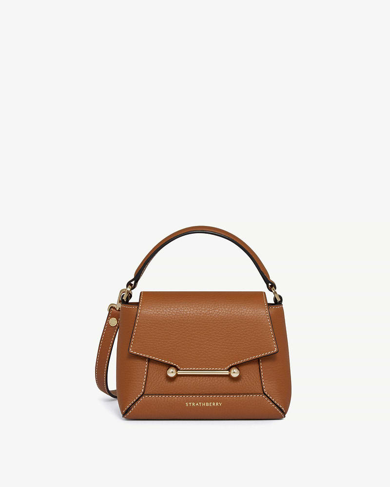 Strathberry Mosaic Nano tan leather top-handle bag with vanilla stitching and gold bar.
