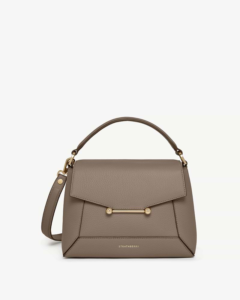 Strathberry taupe mosaic bag with top handle, detachable strap and gold bar.