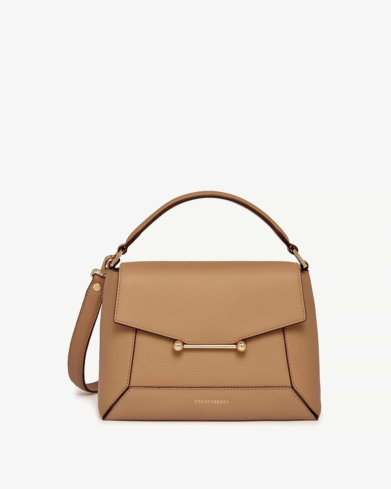 Caramel leather Strathberry mosaic bag with top handle and gold bar fastening.