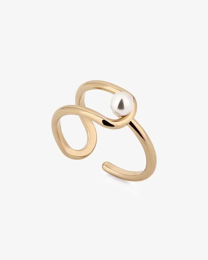 Open 22-carat gold-gilded ring with an off-centre white pearl on top.