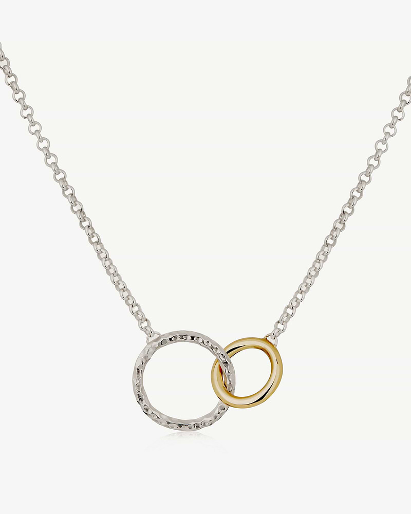 Sterling silver chain with hammered silver halo and 24ct gold-gilded interlocking ring.