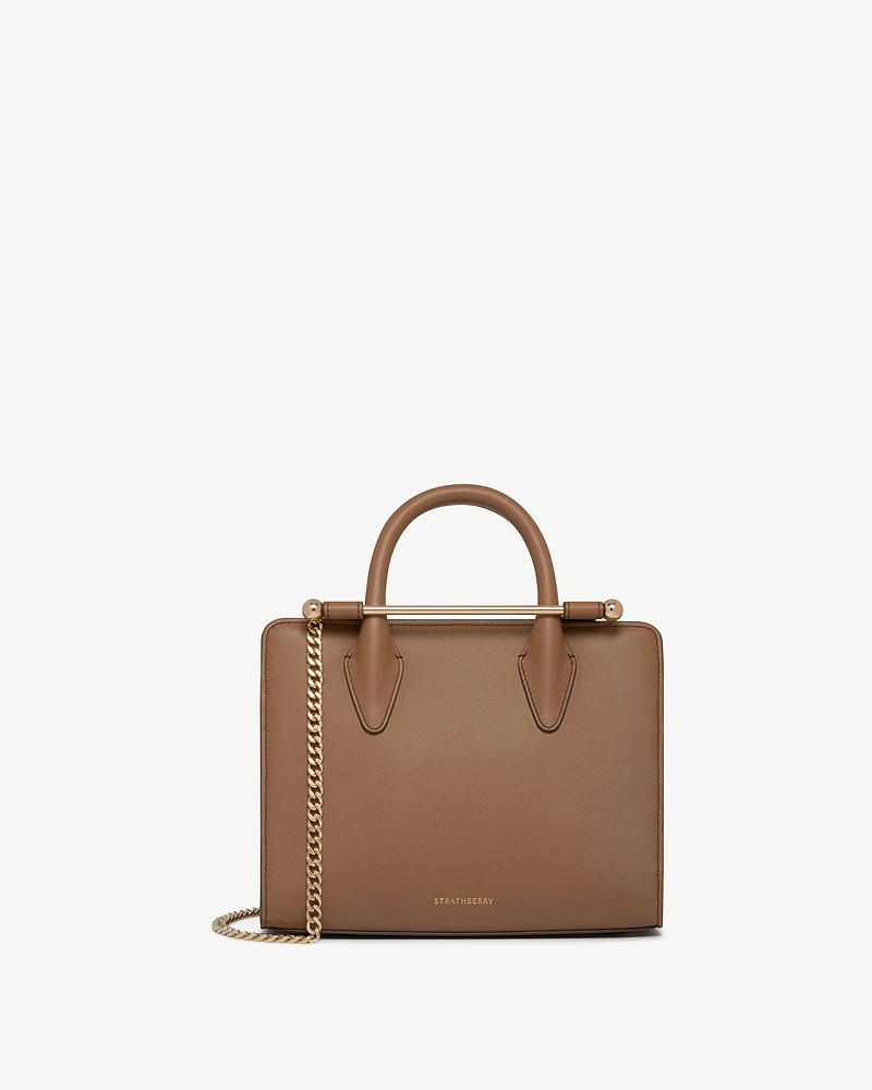 Strathberry clay mini tote with top handles and gold chain strap