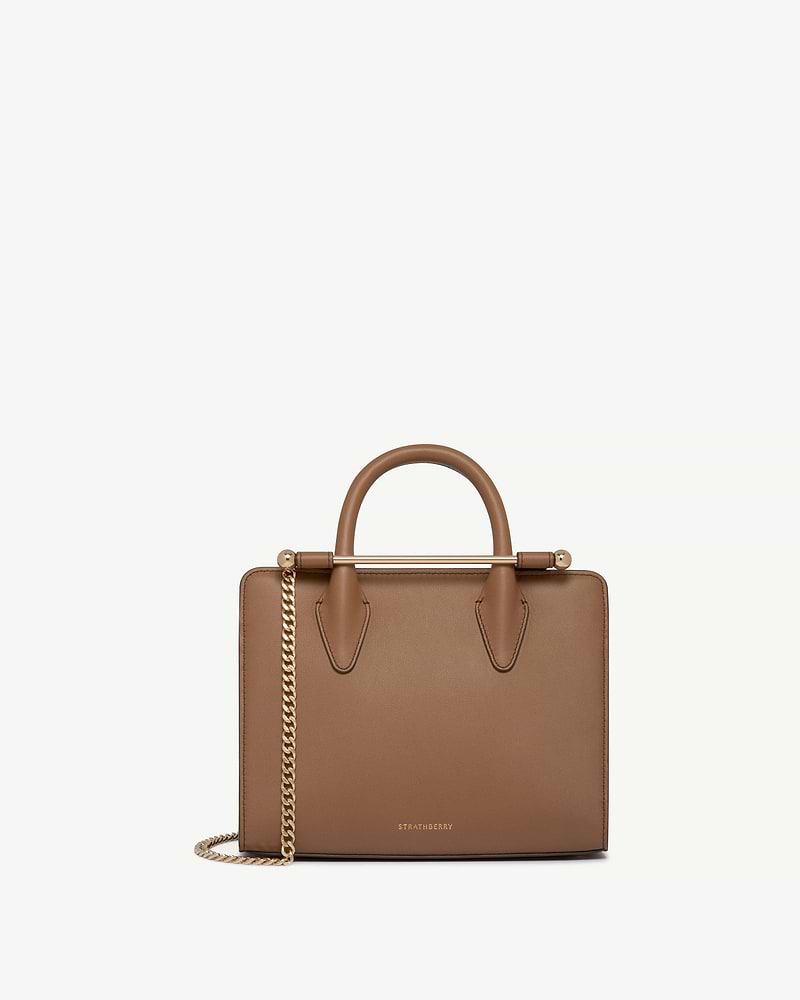 Strathberry clay mini tote with top handles and gold chain strap