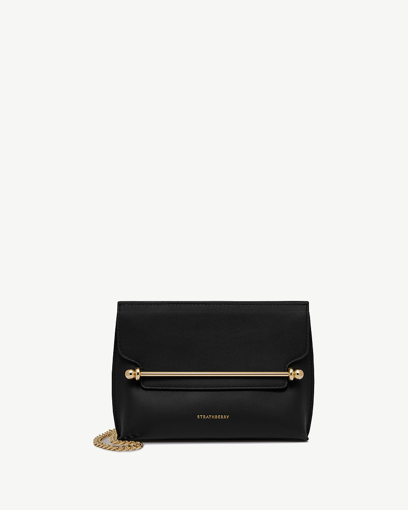 Black Strathberry Stylist Mini bag with gold bar detail and chain strap.
