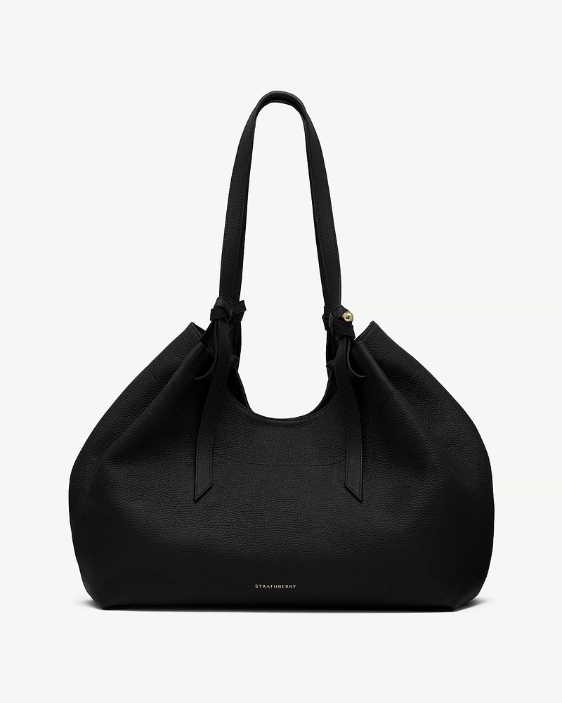 Black Strathberry Barra tote with pebbled leather, knotted handles, gold logo.
