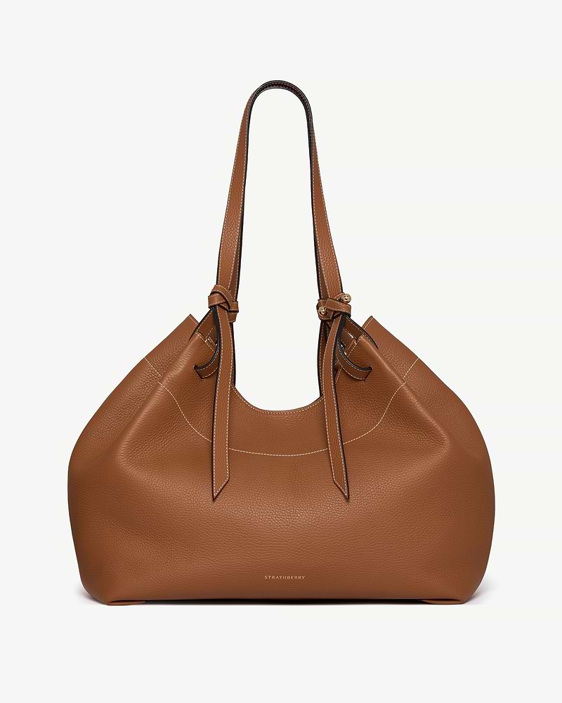 Tan Strathberry Barra tote with knotted handles and pebbled leather finish.