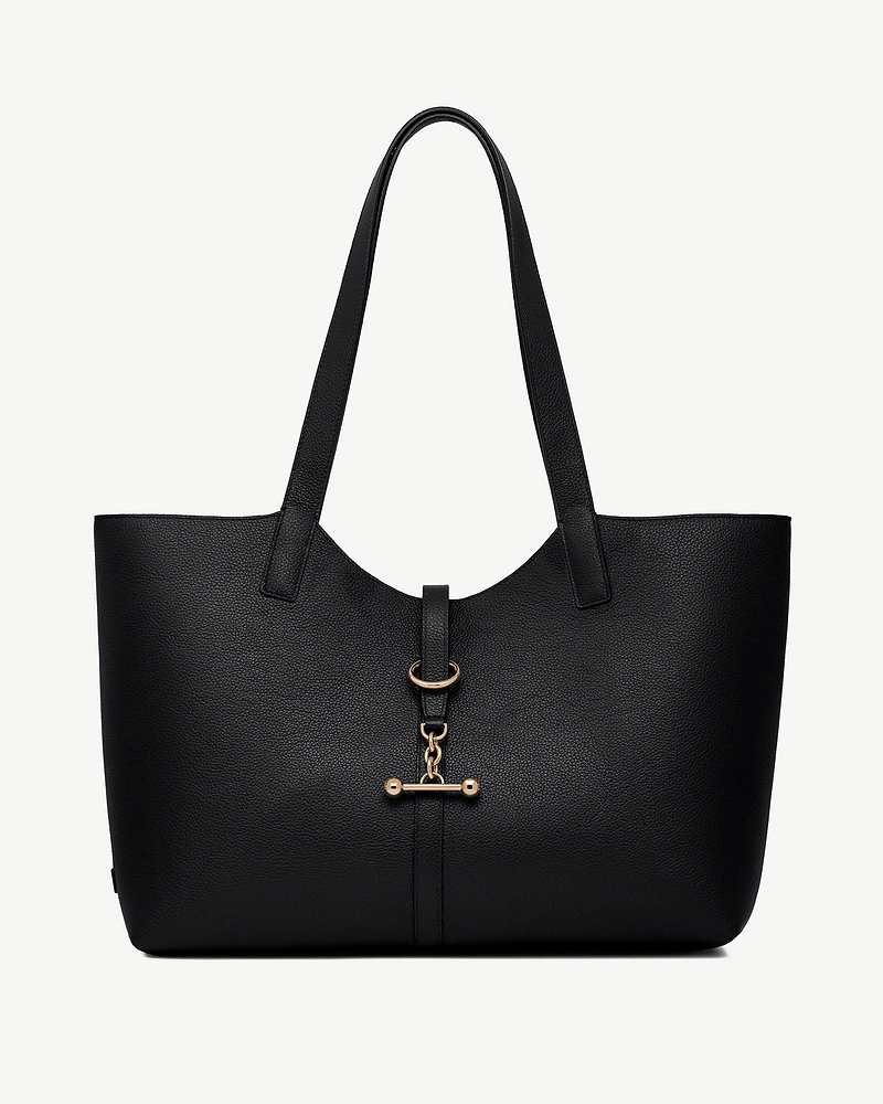 Black pebbled leather tote with long straps and gold bar and ring hardware.