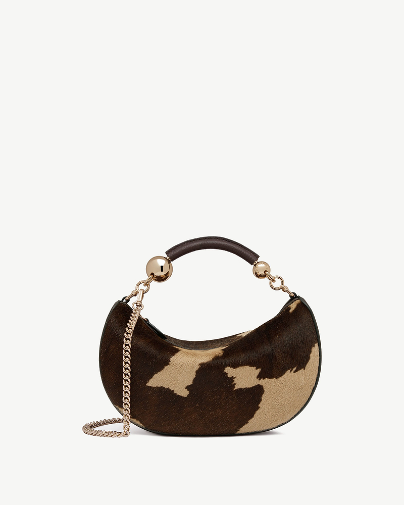 Crescent mini bag in sand and espresso spot print with gold chain strap.