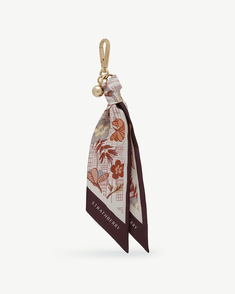 Silk charm with gold clip and round charm, burgundy floral print, Strathberry