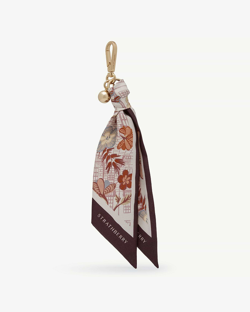 Silk charm with gold clip and round charm, burgundy floral print, Strathberry