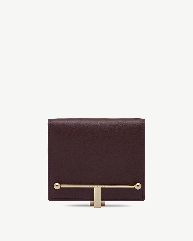 Melville Street wallet in burgundy and walnut leather with gold bar fastening.
