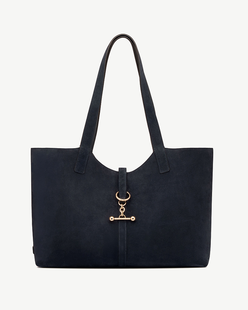 Navy suede tote bag with long shoulder straps and gold ring hardware