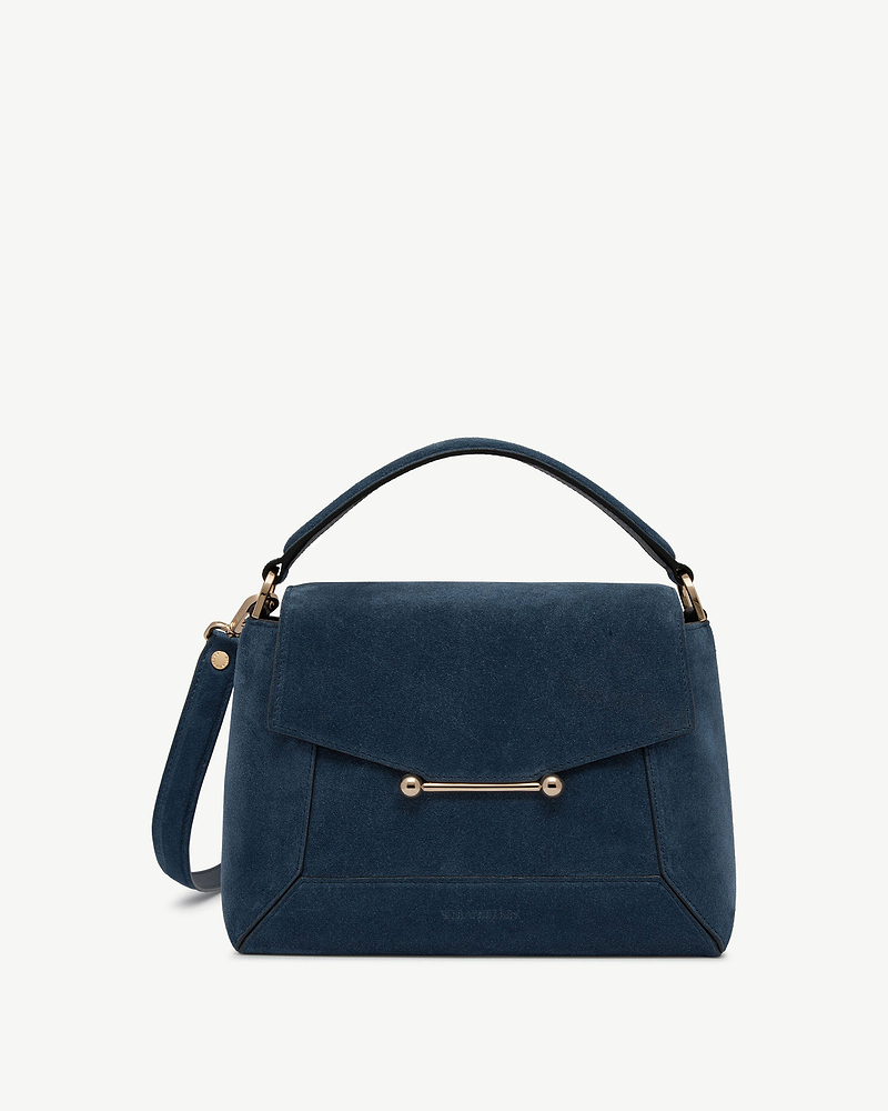Mosaic bag in loch blue suede with top handle, flap closure and gold bar hardware