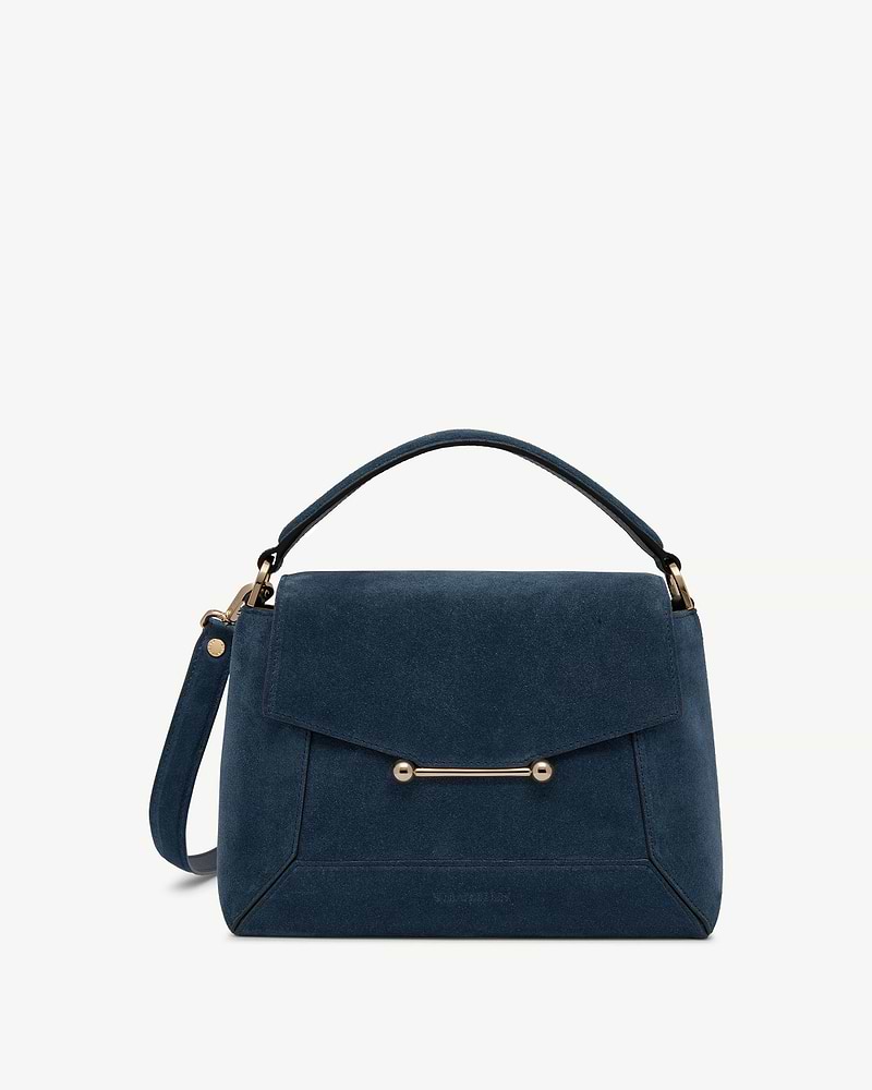 Mosaic bag in loch blue suede with top handle, flap closure and gold bar hardware