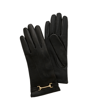 Pair of black Stockbridge gloves with gold horsebit detail, shown flat.