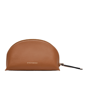 Tan leather dome pouch with gold Strathberry logo and zip pull