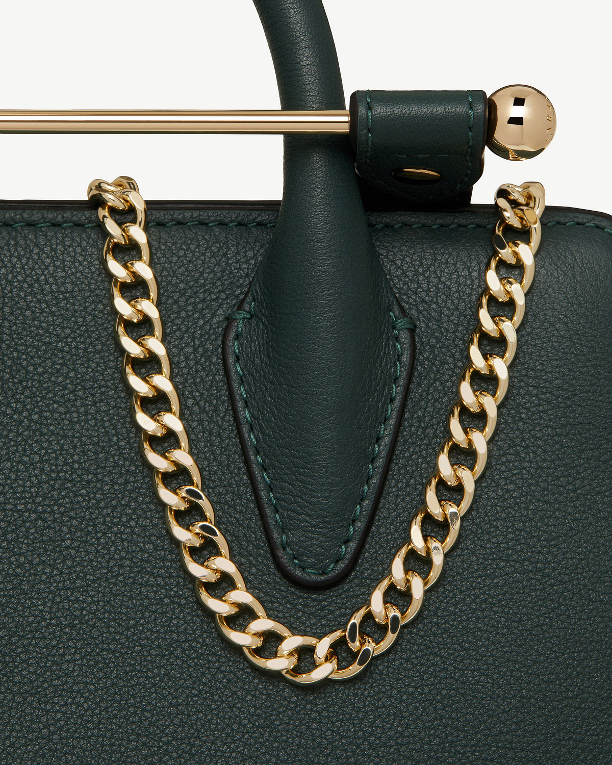 Bottle green nano tote top handle with gold curb chain strap and polished bar.