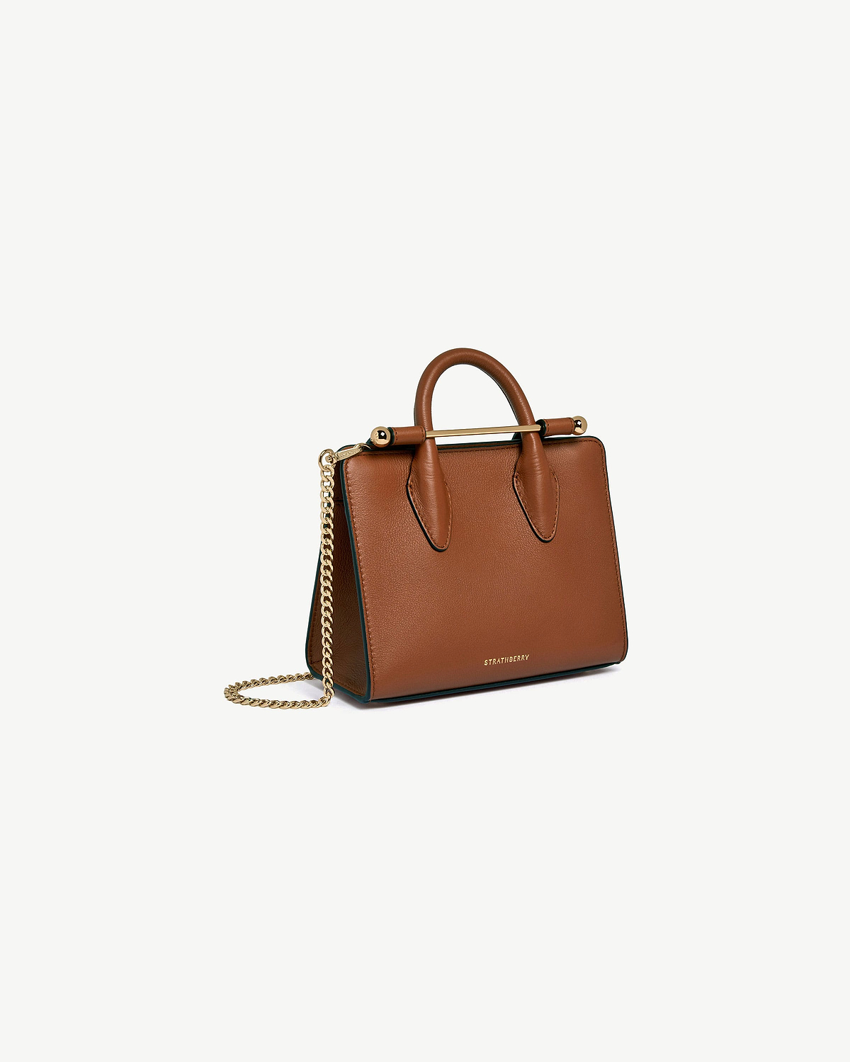 Chestnut Strathberry Nano Tote with top handles, gold bar hardware and chain strap.