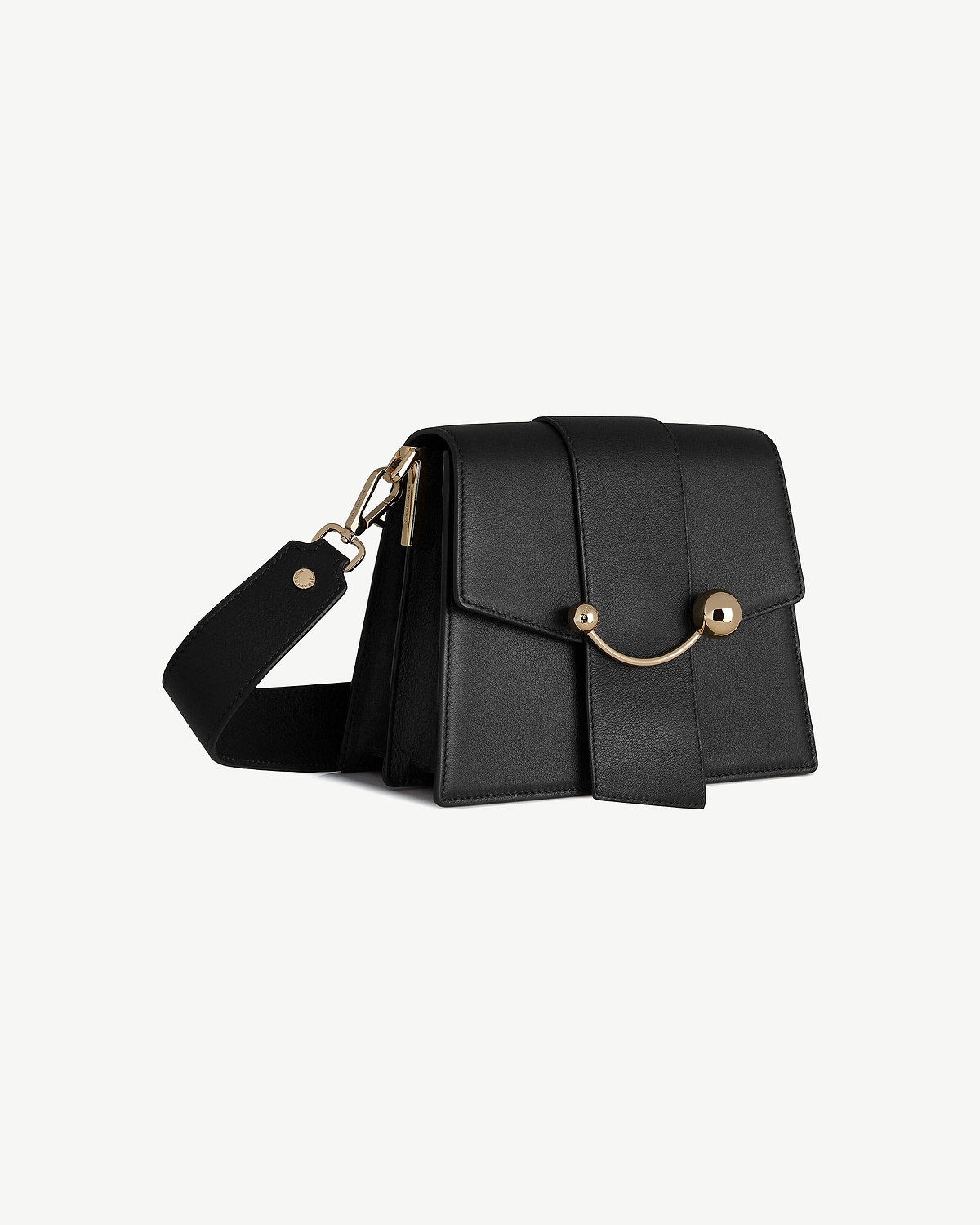 Black box crescent bag with gold crescent-shaped hardware and detachable wide strap