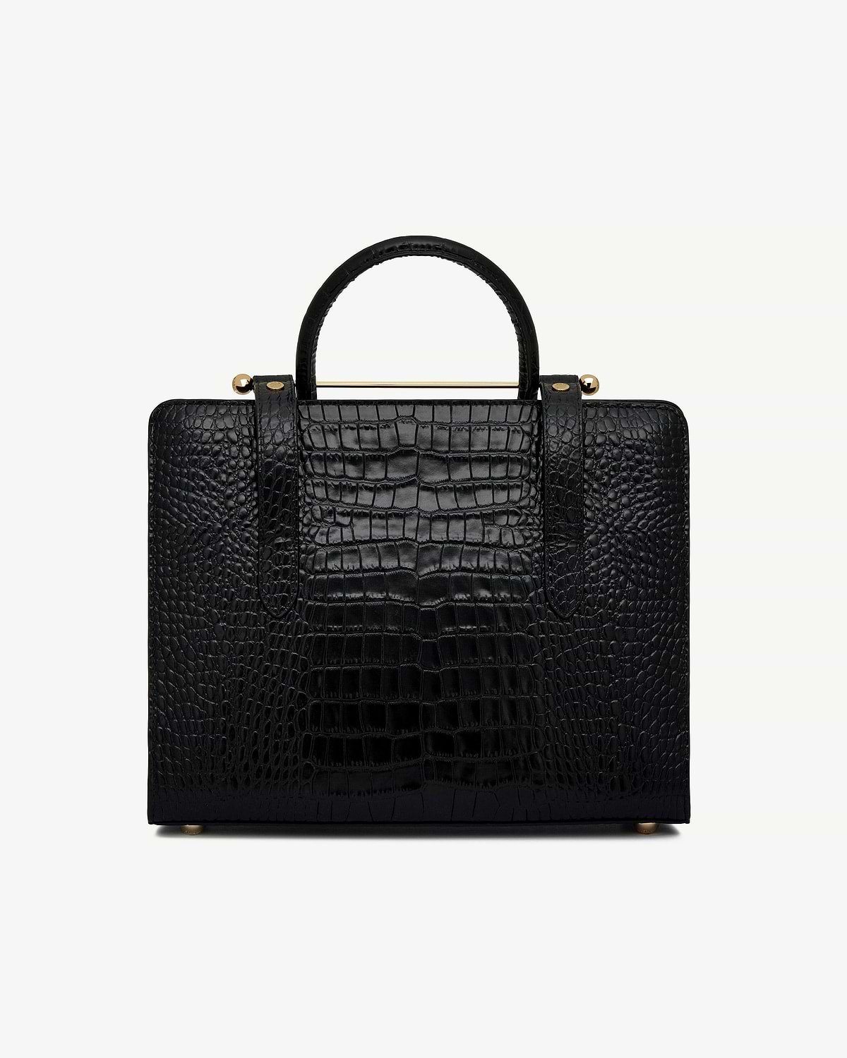 Black croc-texture midi tote with top handle and gold bar detail, front view