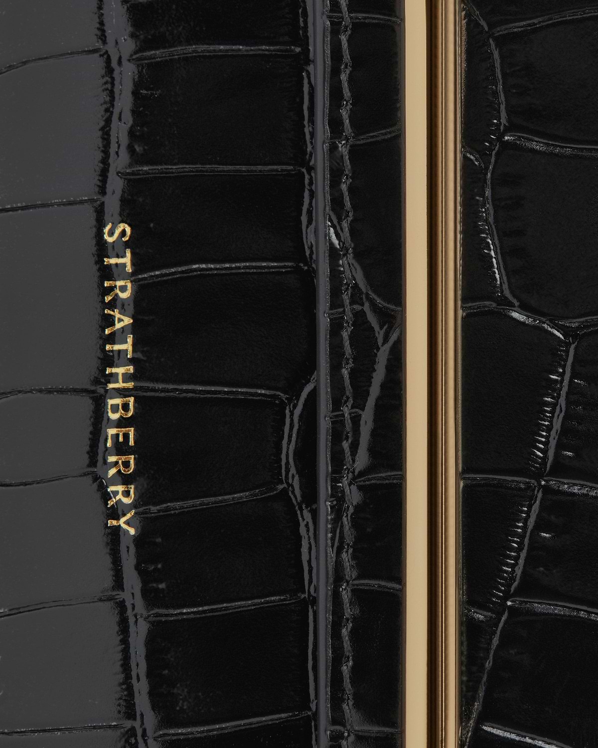 Strathberry Multrees chain wallet in black croc leather with gold hardware and logo