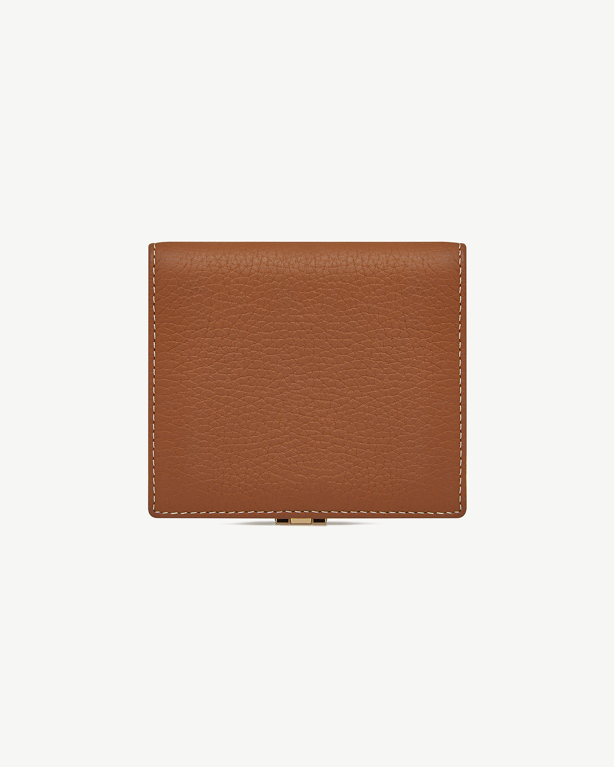 Tan crescent wallet with vanilla contrast stitching, pebbled leather and gold clasp.