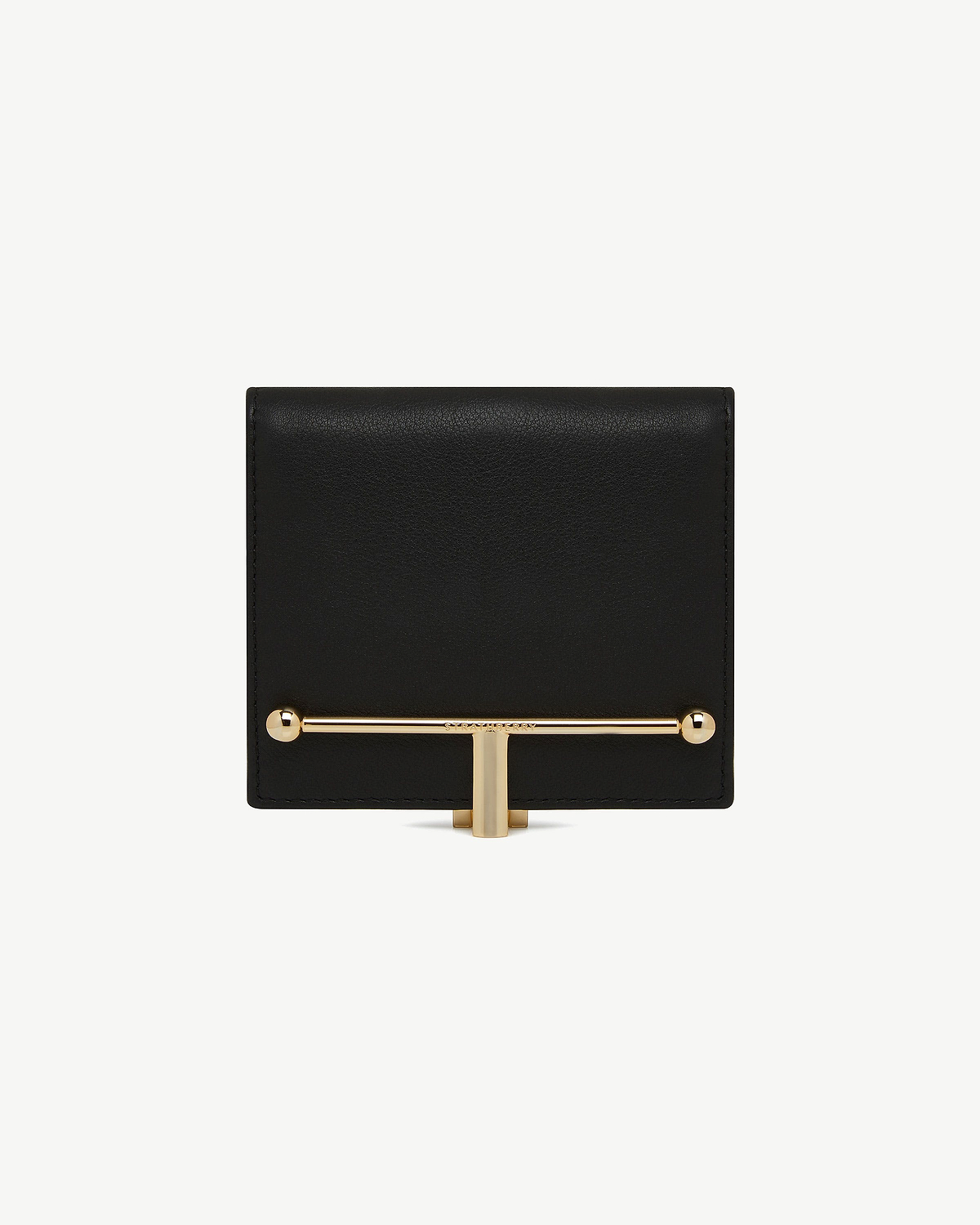 Black leather wallet with horizontal gold bar and T-shaped clasp on front.