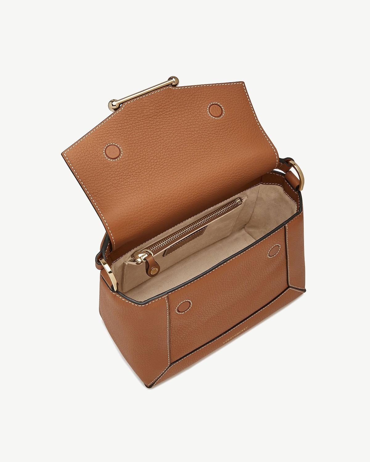 Tan mosaic bag with vanilla stitching, open to reveal suede interior and zip pocket