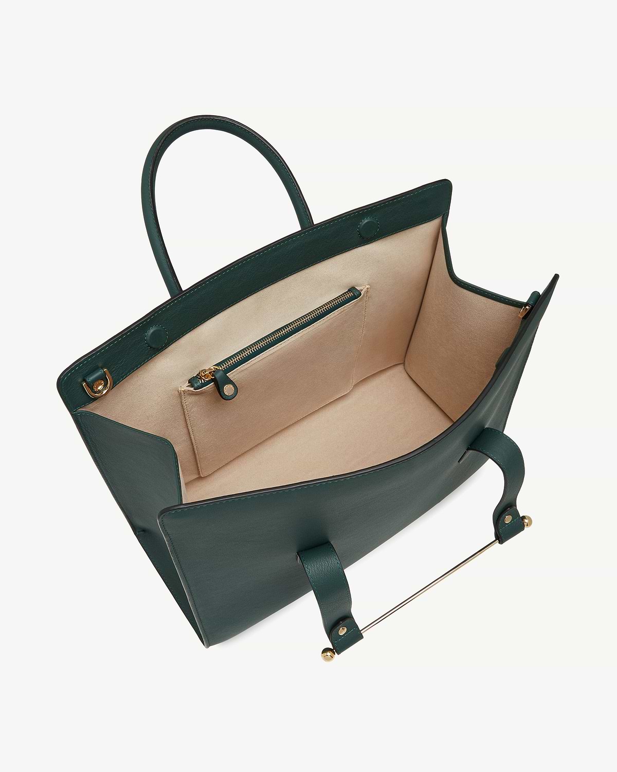 Bottle green leather tote with beige interior, zip pocket and gold hardware.