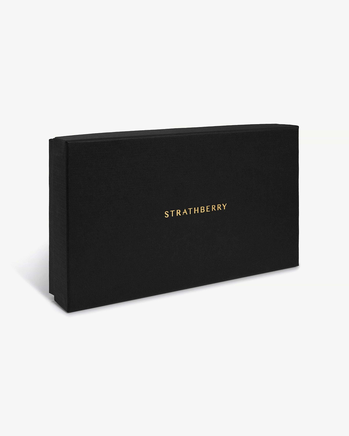 Black textured rectangular box with gold STRATHBERRY logo on a white background.