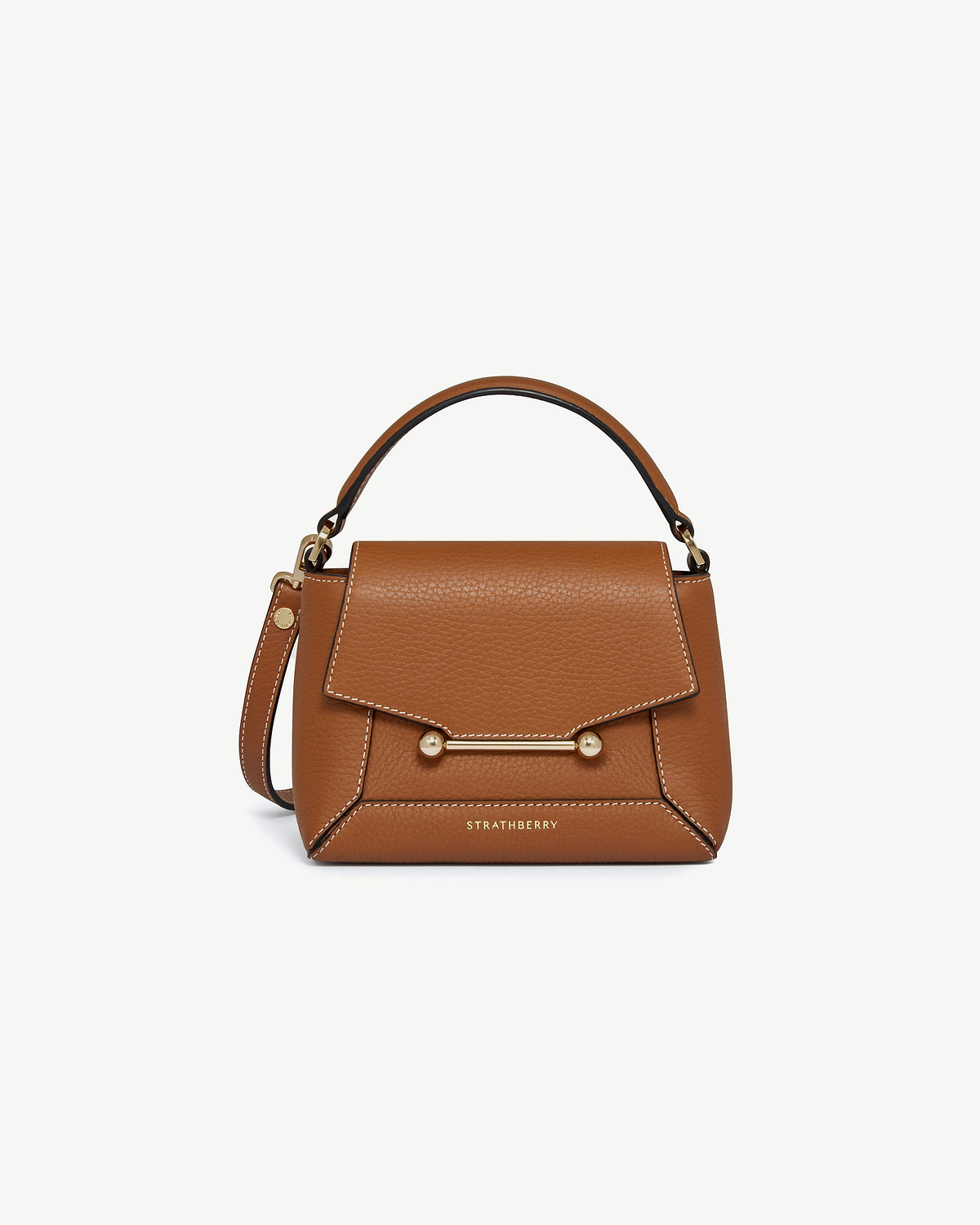 Strathberry Mosaic Nano tan bag with vanilla stitching, top handle and gold bar hardware.