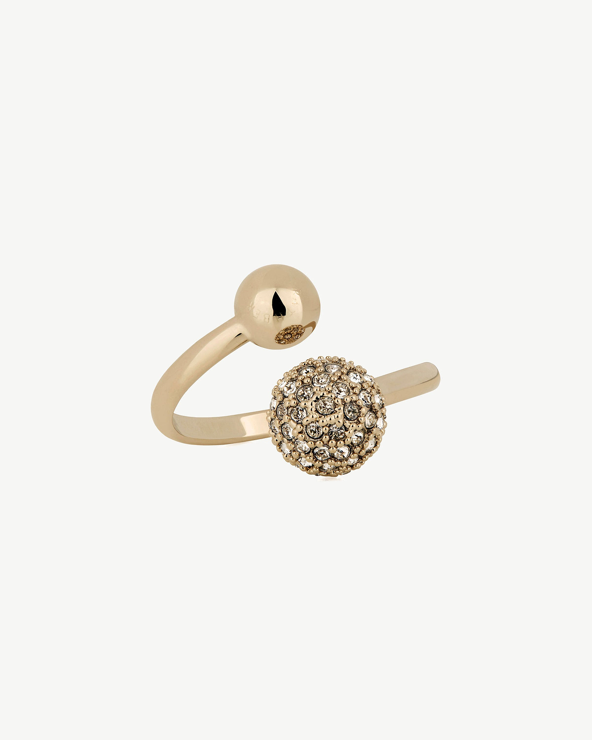 22-carat gold-gilded crescent ring with crystal-studded spherical end on white background