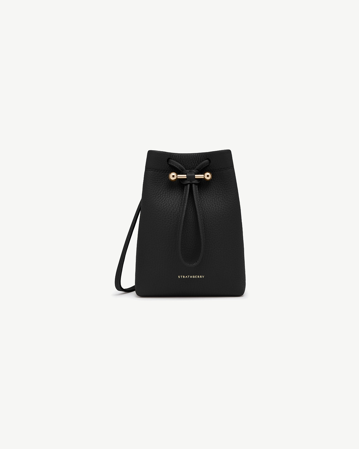 Black Strathberry Osette midi pouch in pebbled leather with drawstring and gold bar.
