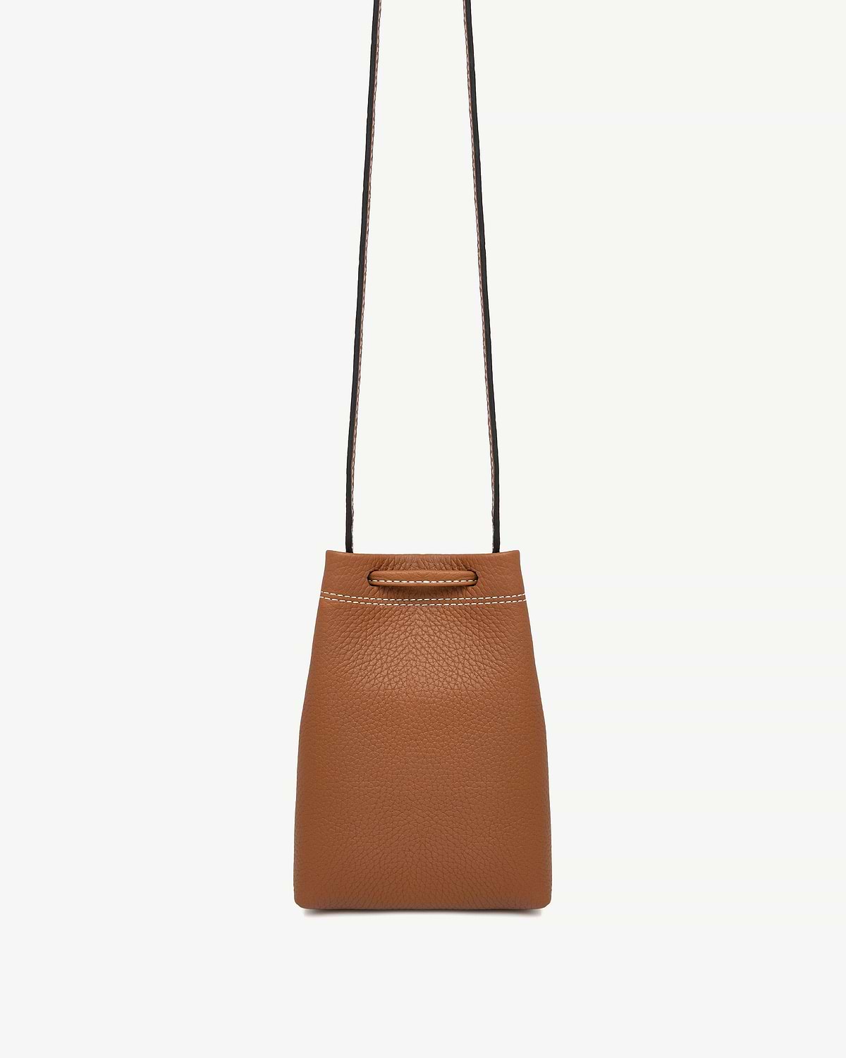 Tan pebble leather midi pouch with thin shoulder strap and white top stitching.