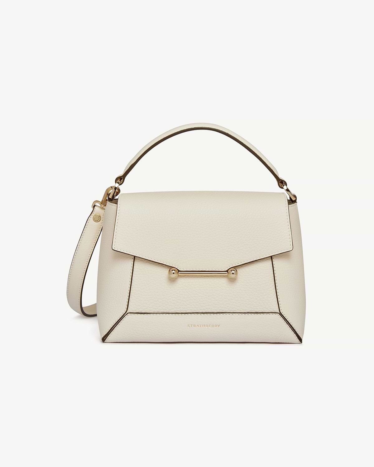 Strathberry Mosaic bag in vanilla leather with top handle and gold bar closure.