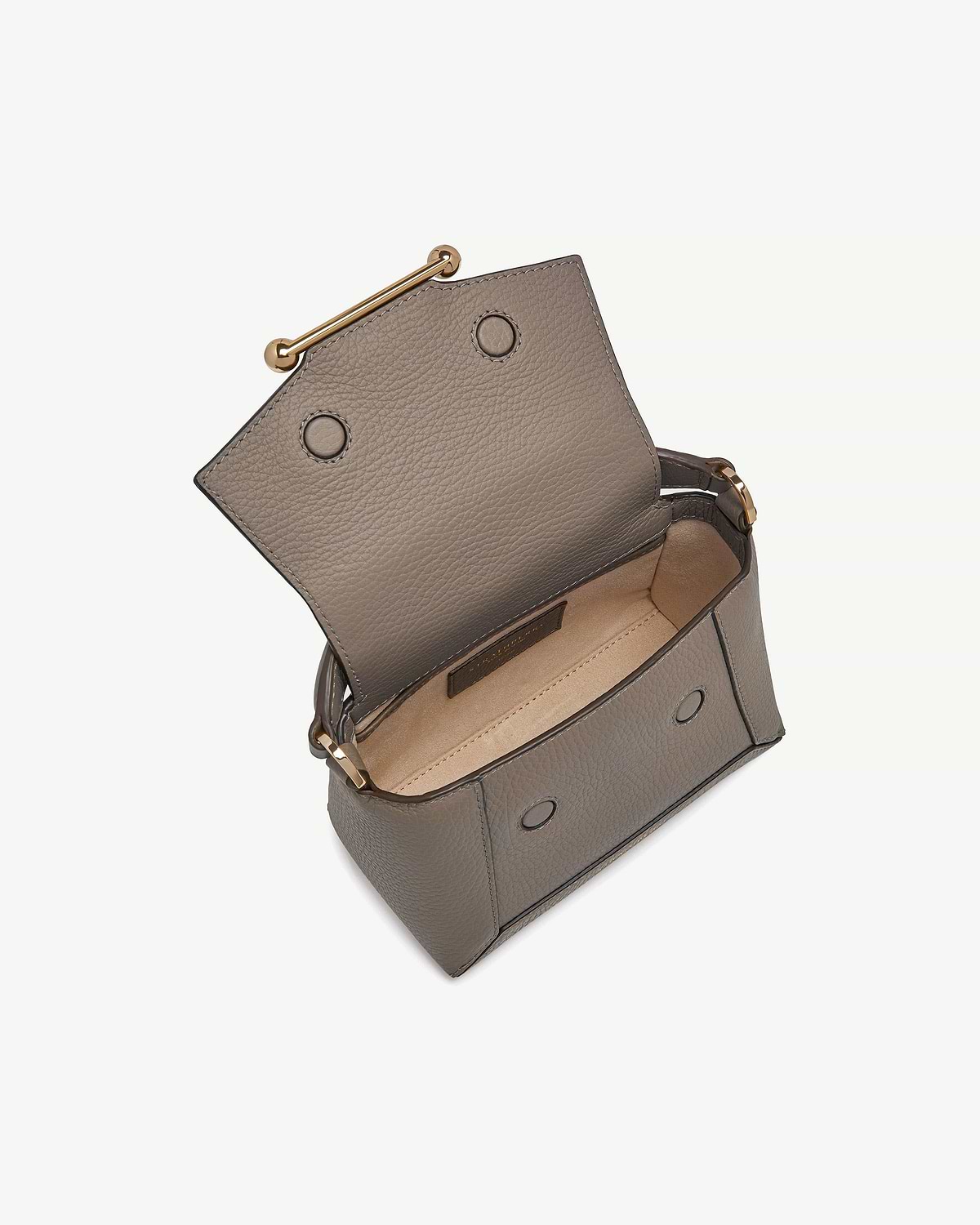Open taupe textured leather nano shoulder bag showing interior and gold hardware.