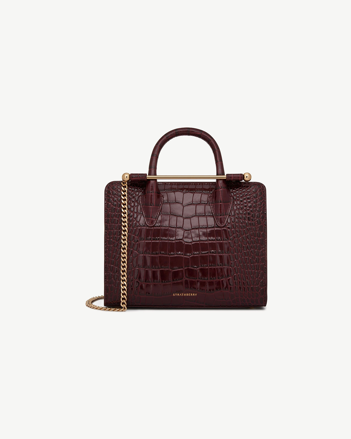 Strathberry burgundy croc mini tote with top handles, gold bar and chain strap