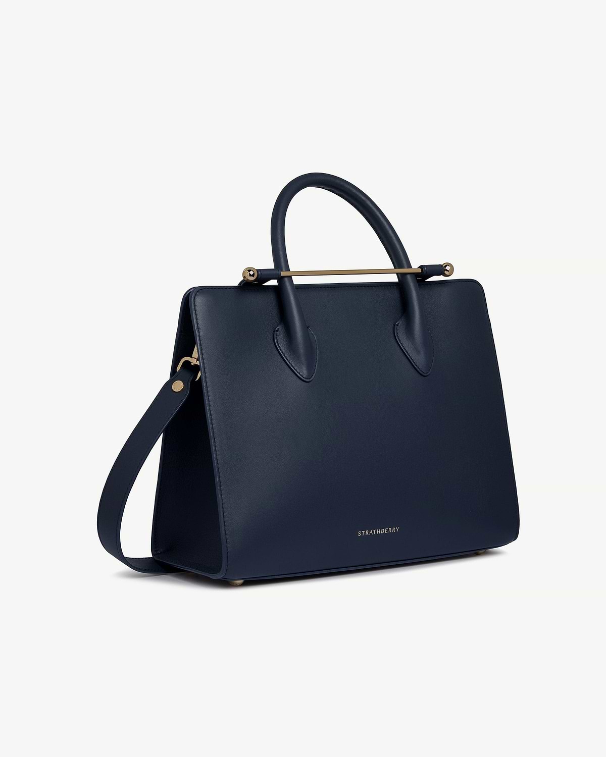 Marine blue Strathberry midi tote with top handles, detachable shoulder strap, gold hardware.
