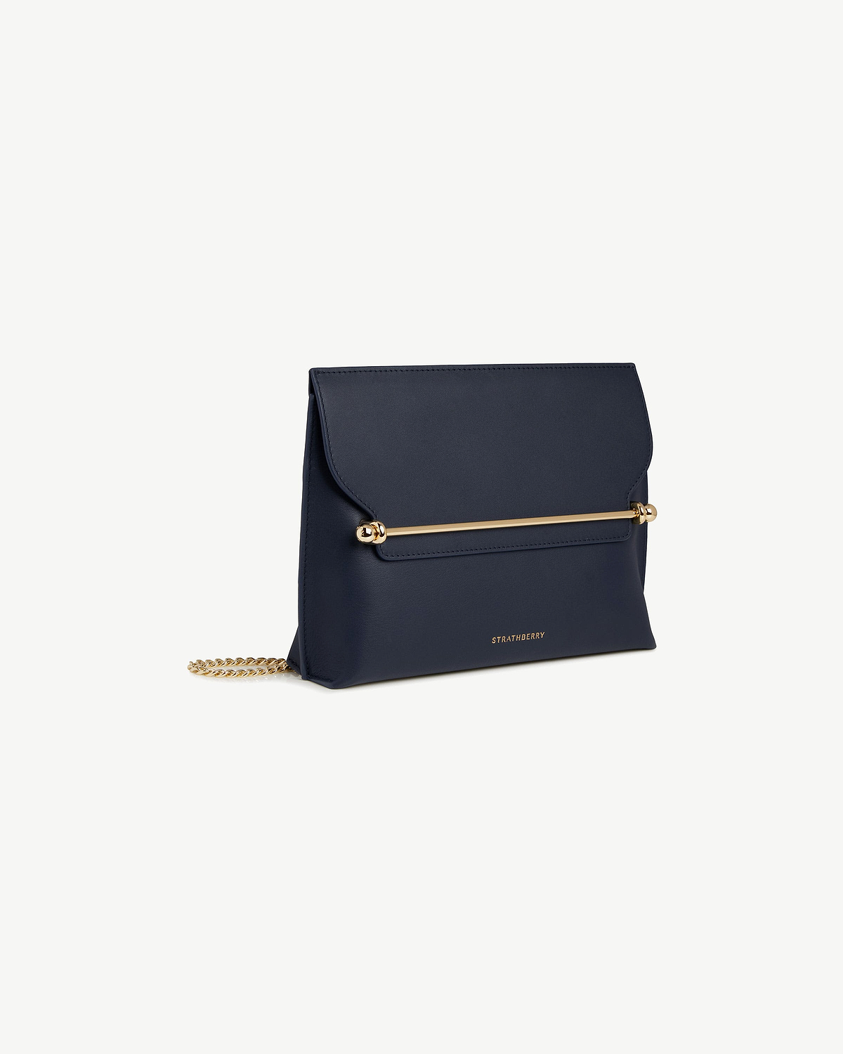 Strathberry Stylist bag in marine blue with gold bar detail and chain strap