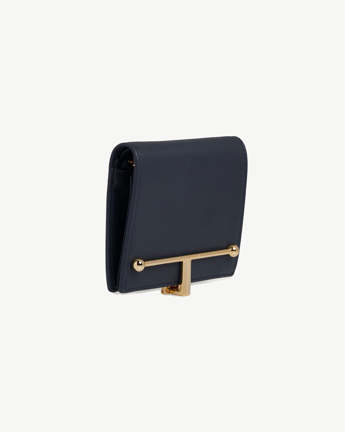 Marine blue folded wallet with gold T-bar clasp and compact profile