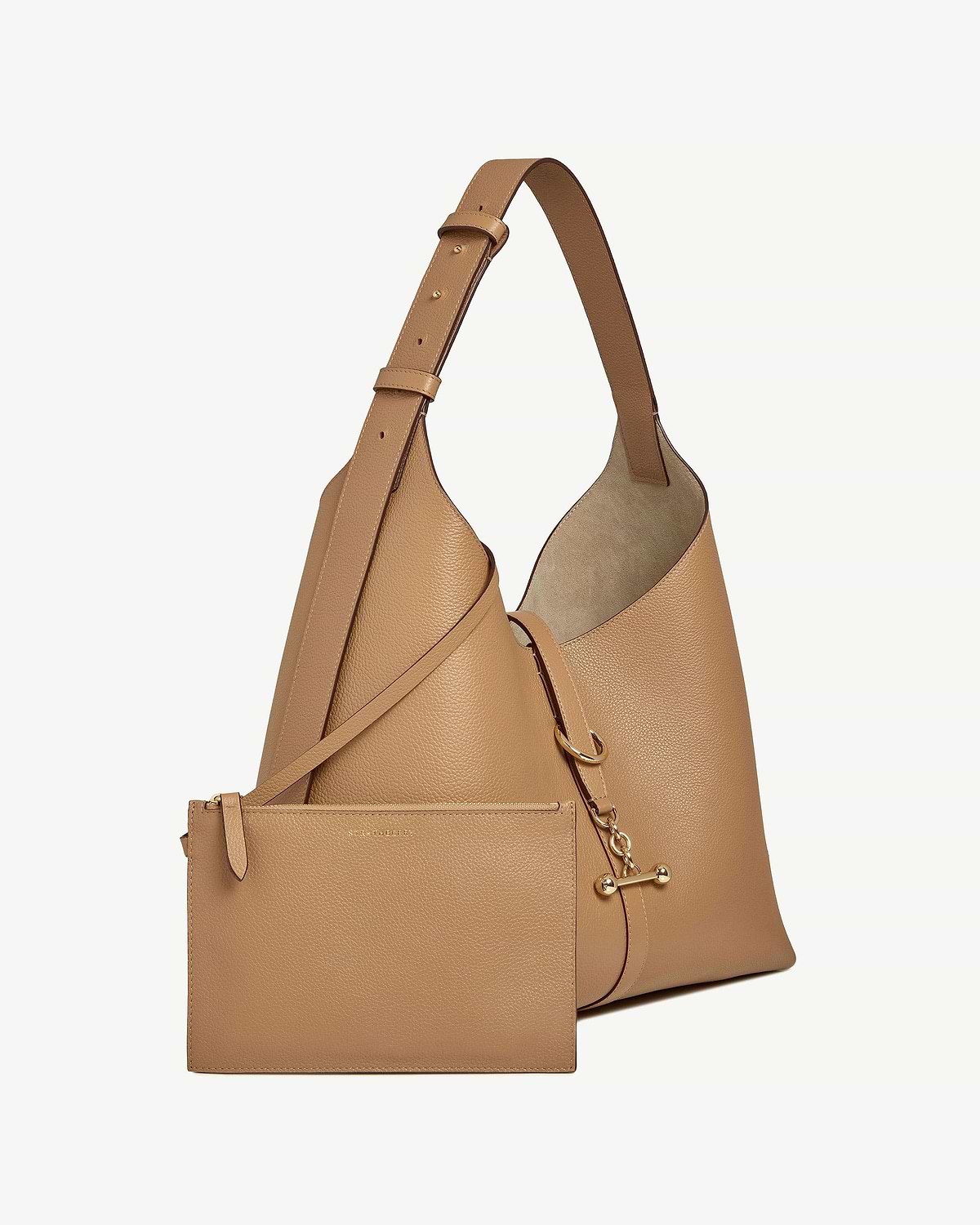 Caramel leather hobo bag with adjustable strap, pouch and gold hardware.