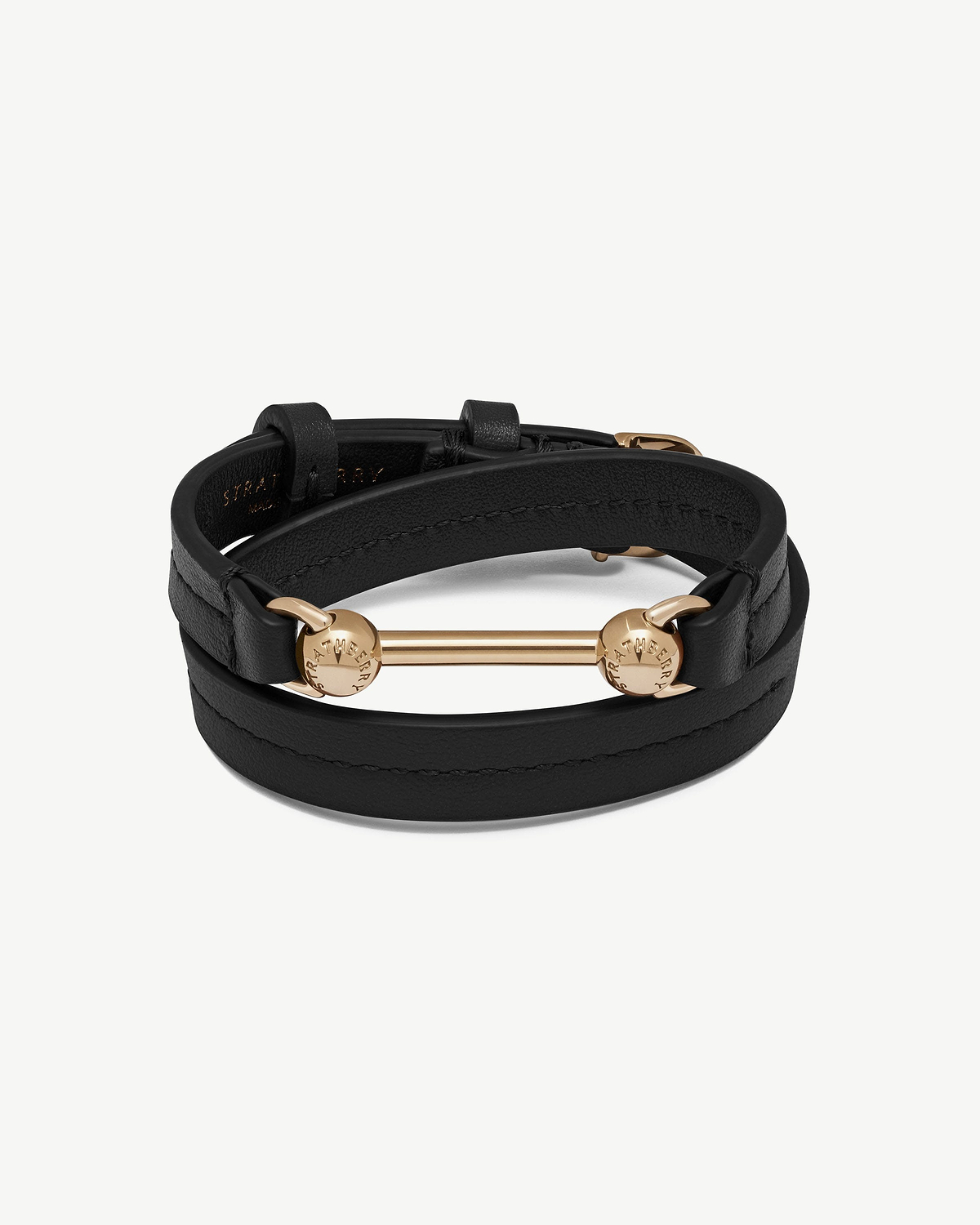 Black double-wrap leather bracelet with gold Strathberry bar and discs.
