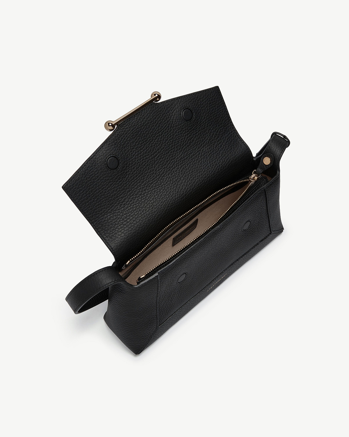 Black pebbled leather mosaic shoulder bag with gold bar closure and internal zip pocket.
