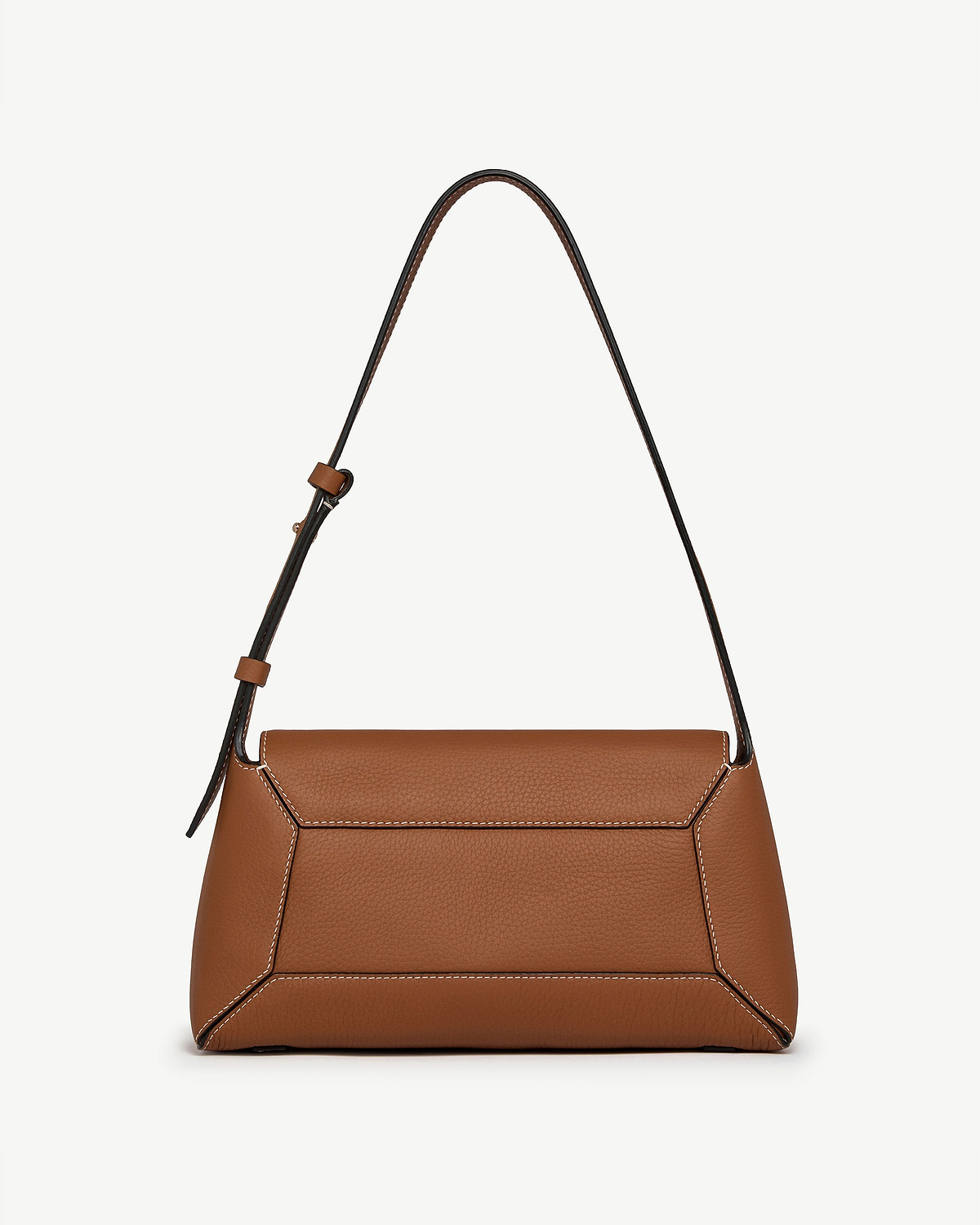 Tan shoulder bag with adjustable strap, flap top and white topstitching.