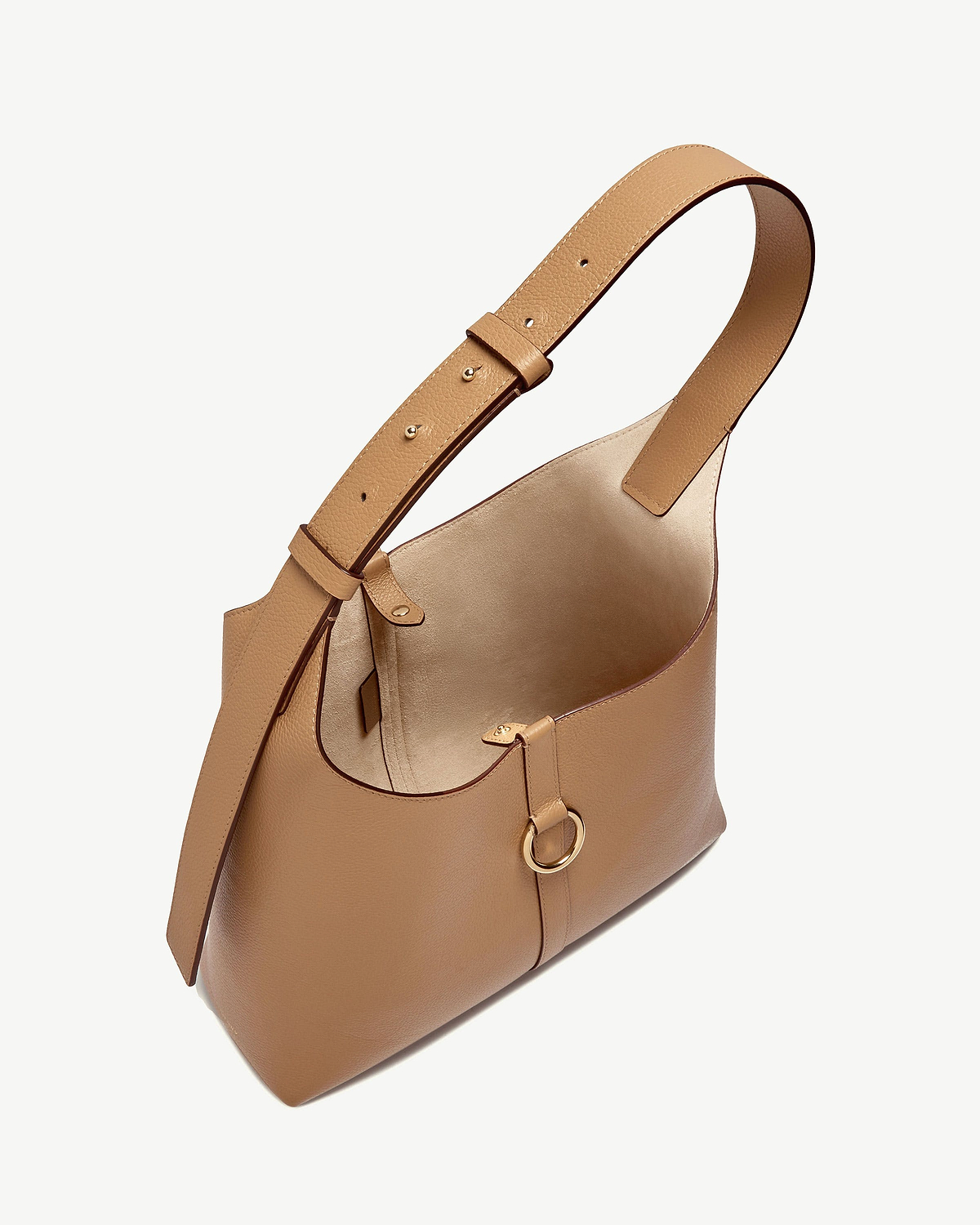 Caramel leather kite hobo bag with adjustable shoulder strap and gold ring detail