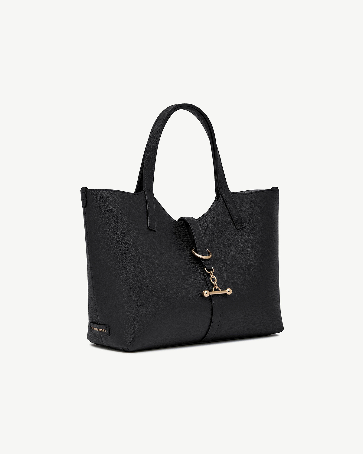Black Strathberry Kite Tote Midi with top handles and gold bar clasp.