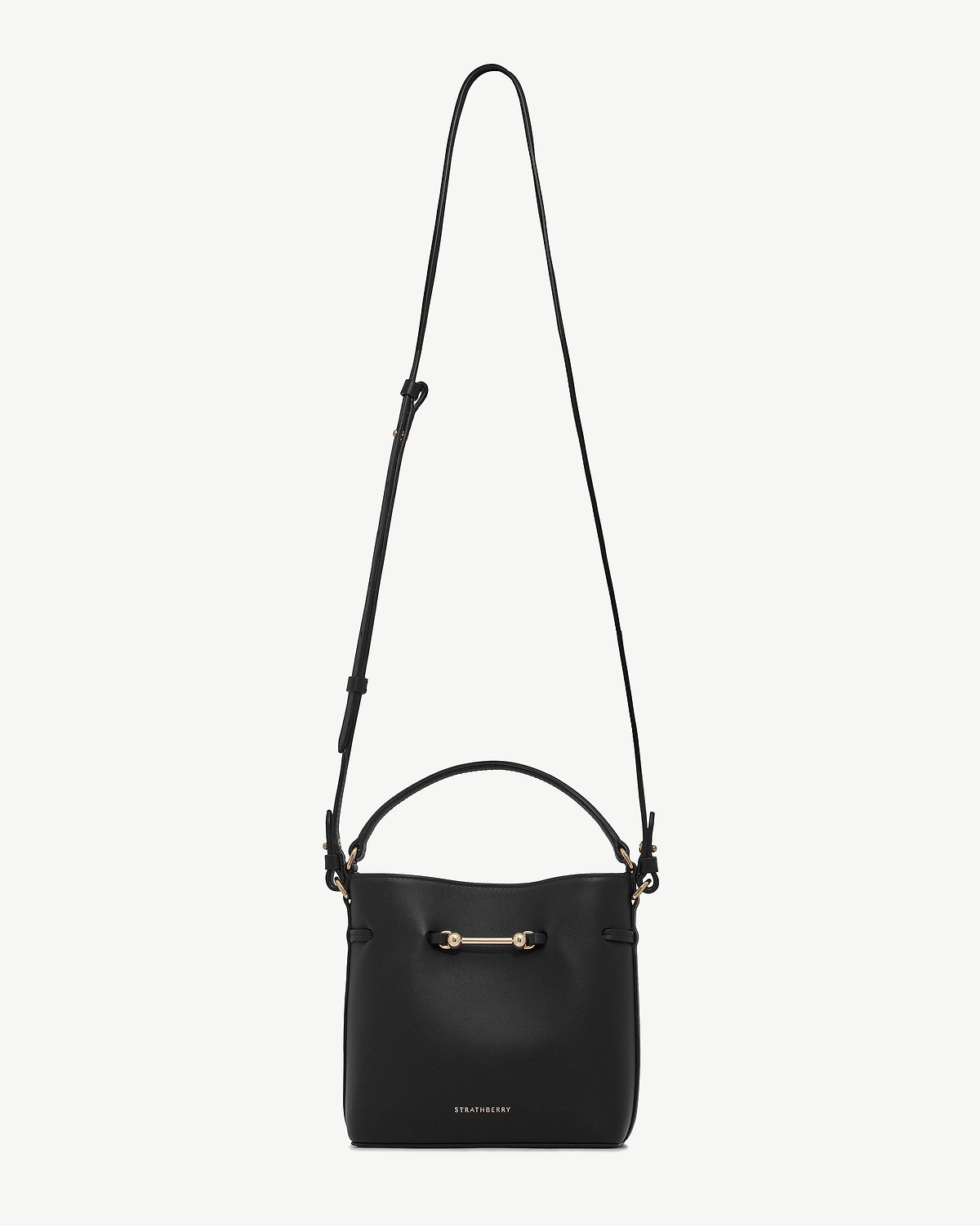 Strathberry Corda Bucket Mini black leather bucket bag with gold hardware and adjustable shoulder strap